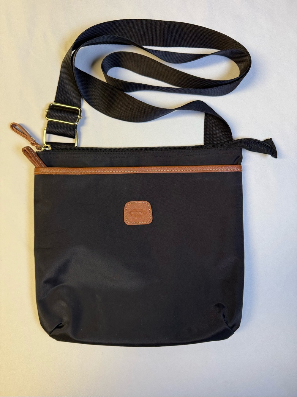 Bric's Black Messenger Crossbody with Brown Trim